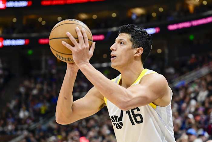 Utah Jazz forward Simone Fontecchio (16) shoots the ball against the New Orleans Pelicans during the first half at Delta Center.